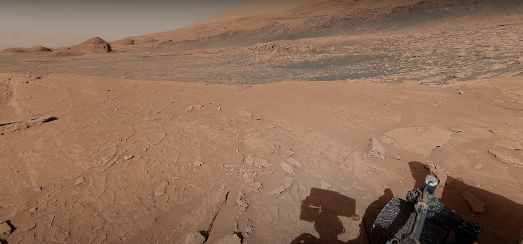area of mars visited by curiosity shows steep cliffs and blue water its a camera trick 6